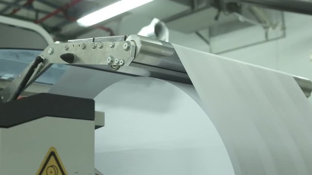 Industrial inkjet printer with audio dolly shot.