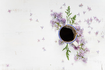 Coffee and purple lilac