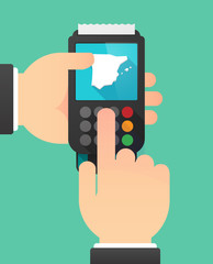 Person hands using a dataphone with  the map of  Spain