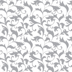Classic seamless pattern. Tracery of twisted stalks with decorative leaves on a white background. Vintage style