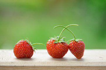 strawberries on a wooden table