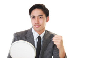 ヘアーセットに満足する男性