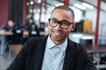 Fototapeta premium Close-up portrait of smiling businessman