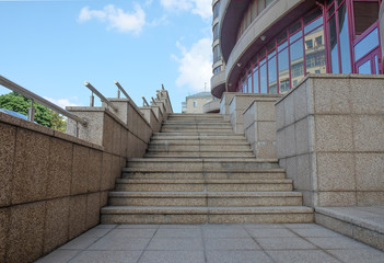 Modern city building a street stairs and sky