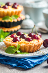 Small tarts with fresh cherries