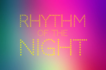RHYTHM OF THE NIGHT text on colorful gradient background