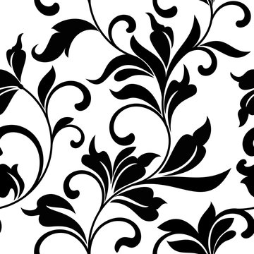 Elegant seamless pattern with black classic floral tracery on a white background. Vintage style.