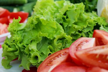 Fresh lettuce and sliced tomato