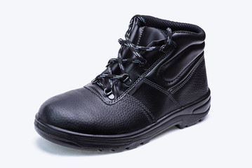 Black safety shoe/One black safety shoe isolated on white background