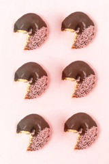 lots of donuts in rows, pattern made of donuts