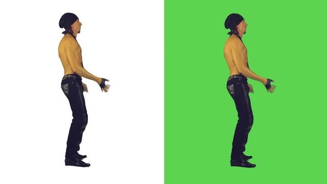 sexy man rhythmically dancing , side view.

 The white background to evaluate the picture, green for ease of separation of the object from the background.
