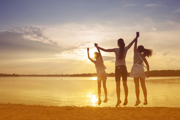 family on the lake in the evening