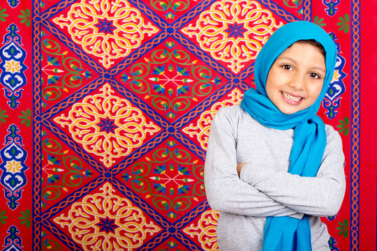 Ramadan Kareem - Happy Young Muslim girl celebrating Ramadan