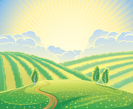 Summer rural landscape with hills and road. Sunrise over the hills that morning.