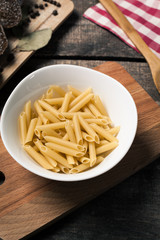 Pasta collection on rustic wooden background