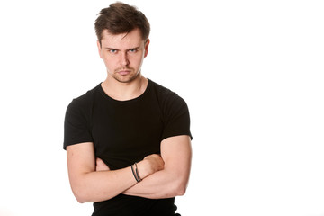 Obraz premium Portrait of serious young man, questioning expression,horizontal