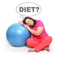 Fototapeta premium Overweight woman dreaming on the ball. People isolated on white background. Healthy lifestyle, slimming and dieting theme. Weight loss idea. Picture with space for your text.