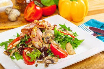 Warm mushroom salad with chilli and tomatoes