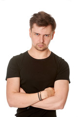 Obraz premium Serious young man with light beard, isolated on white background