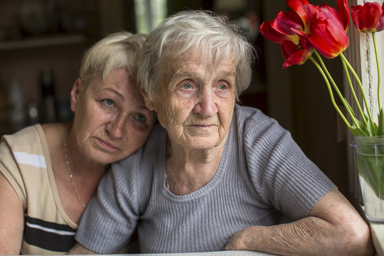 A Woman 80 Years Old With His Adult Daughter.