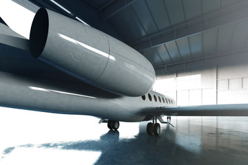 Photo of White Glossy Luxury Generic Design Private Jet parking in hangar airport. Concrete floor. Business Travel Picture. Horizontal, view from behind the turbine. Film Effect. 3D rendering.