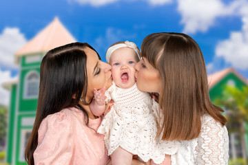 mother with daughter and aunt godmother