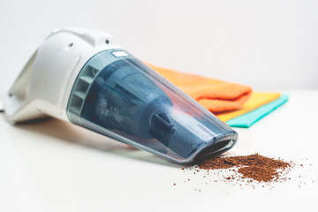 a hand-held vacuum cleaner on a white background