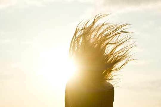 girl's hair against the sun