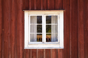 Naklejka na ściany i meble Old wooden wall with window in white frame