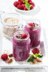 raspberry smoothie with oatmeal and chocolate, vertical