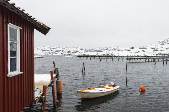 Rowing boat moored at jetty