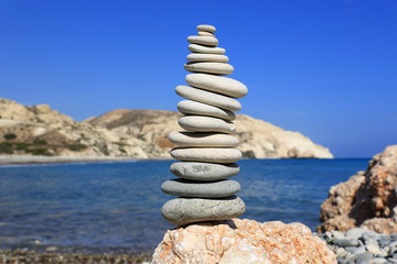 Stones pyramid on sea