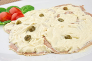 Vitello tonnato - slices of veal with tuna sauce and capers