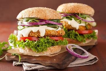 veggie carrot and oats burger with cucumber onion tomato