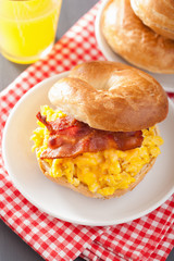 breakfast sandwich on bagel with egg bacon cheese