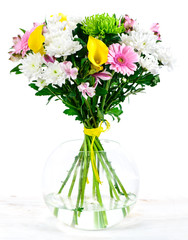 Colorful flower bouquet arrangement centerpiece in vase isolated