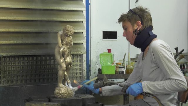laying a patina from titanium white on bronze