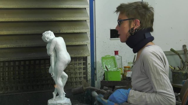 laying a patina from titanium white on bronze