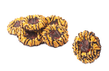 Single cookie next to Pile of cookies isolated over the white background