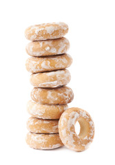 Stack of small cakes with hole isolated over the white background