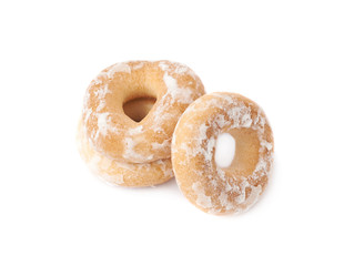 Stack of small cakes with hole isolated over the white background