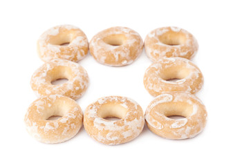 Pile of small cakes with hole isolated over the white background