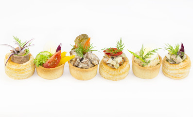 Mini Canape with meat and vegetables in plastic cups