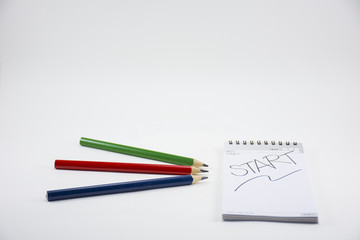 Background business isolated.With note book and pencil and begin story .On white background