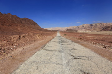Long road in the desert, concept.