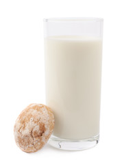 Glass of milk and cookie isolated over the white background
