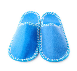 Pair of house slippers isolated over white background