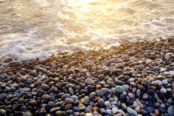 Nature background with pebble on sunset