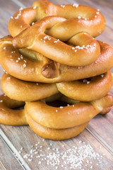Stack of fresh baked soft salted pretzels.