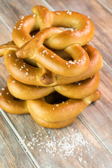 Stack of fresh baked soft salted pretzels.